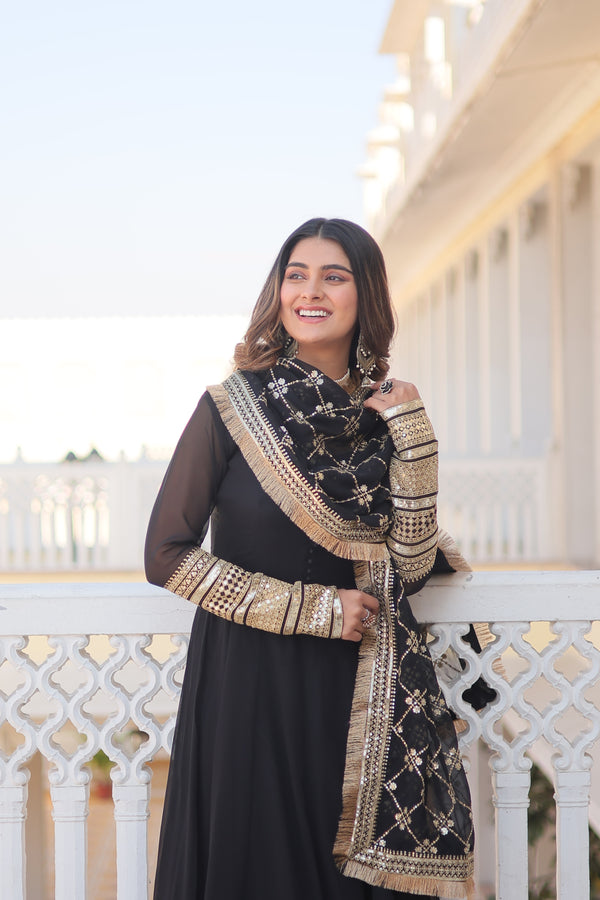 Black-Faux Blooming Gown with Dupatta With Attractive Embroidered Sequins work with Lace Border.